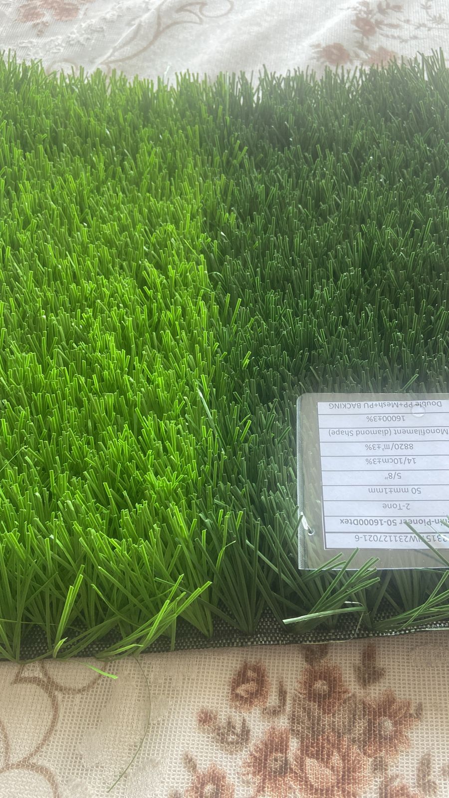 Multi-sports artificial turf in two shades of green