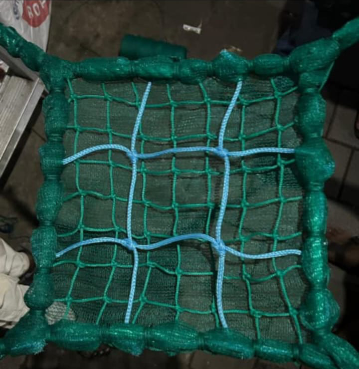 Close-up of a thick braided rope safety net